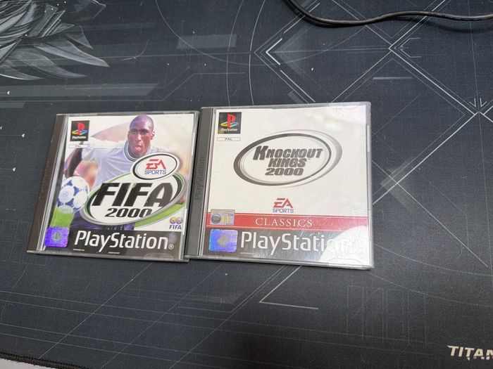 Set of 2 playstation games used working