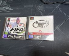 Set of 2 playstation games used working