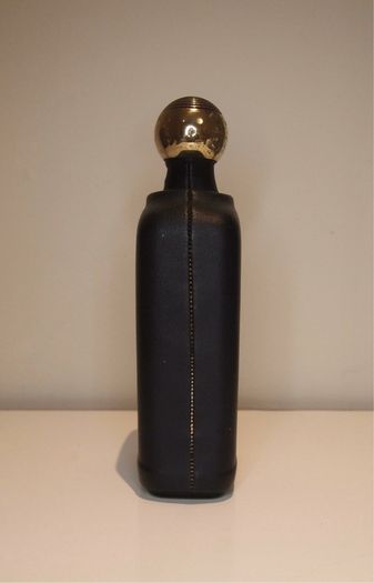 Bottle/carafe in leather-like material
