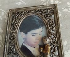 Metal Frame with figurine