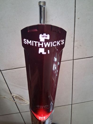 Large Smithwicks beer tap tower