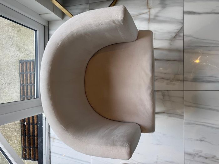 Cream and gold armchairs
