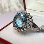 A beautiful vintage silver ring with Sky Blue Topaz and White Topaz. Image 4