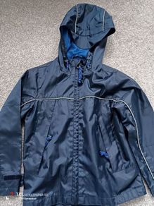NEW.boy's rain light jacket. Age 4/5