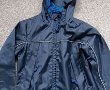 NEW.boy's rain light jacket. Age 4/5