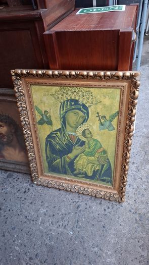 Antique holy statue and pictures