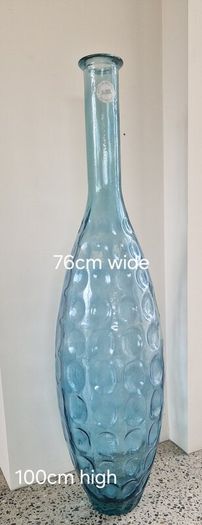Large hand made aqua blue vase.