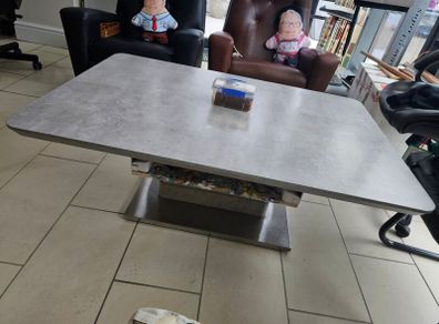 Height-adjustable dinner-coffee Table