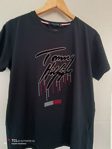 New.women's t-shirt. Size 14