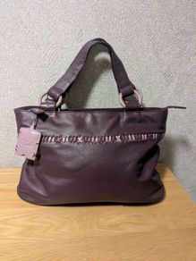Designer Yoshi purple colour leather handbag