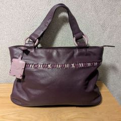 Designer Yoshi purple colour leather handbag