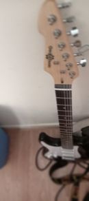 lefthand electric guitar and 20 watts amp