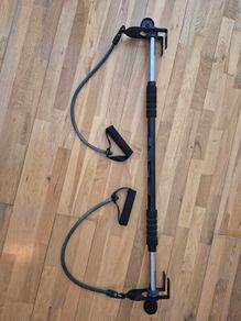 Toning bar with resistance bands