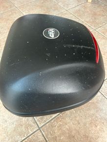 Motorcycle helmet top box