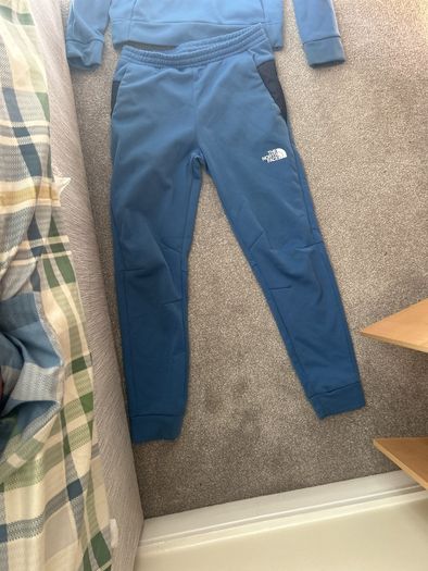 Blue kids north face tracksuit