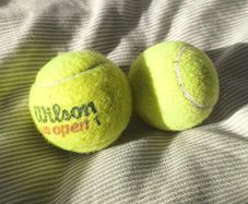 Pair of Tennis Balls (1x Wilson US Open + 1x Unbranded)