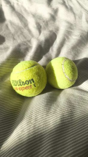 Pair of Tennis Balls (1x Wilson US Open + 1x Unbranded)