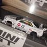 Mini GT 1:64 scale diecast model of the Nissan LB-ER34 Super Silhouette Athlet/Collet car. Liberty Walk's Nissan Skyline GT-R Blister Pack Image 9