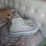 white converse hightops Image 3