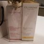 FREE tote bag or cosmetic bag with these items - Clarins Tonic Bath and Shower Concentratel and Hand and Nail.Treatment Cream 100 ml - Brand New - Gift Wrapped Image 2