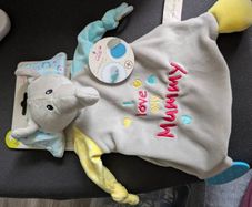 Comforter with teething ring & soother attachment