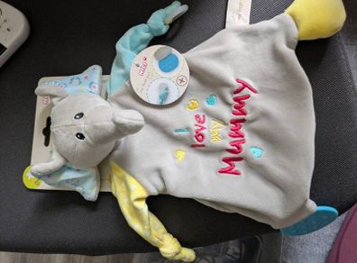 Comforter with teething ring & soother attachment