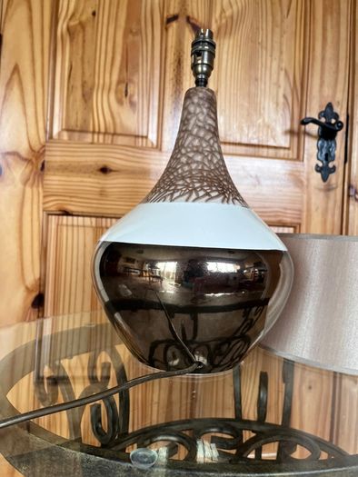 Ceramic lamp 65 euro. Brass with glass shade 95 euro . Chinese style 50 euro .