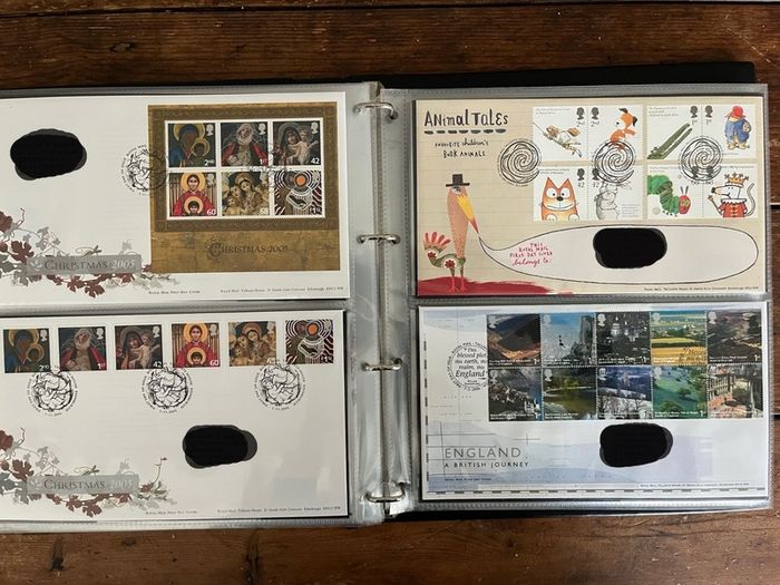Collection of  87 UK First Day Cover stamps 2003 to 2006 in album