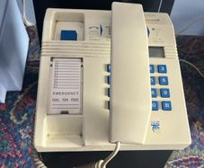 old style payphone. Phone Money vault was opened. Steel bent and open