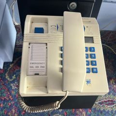 old style payphone. Phone Money vault was opened. Steel bent and open