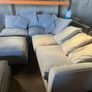 Grey corner sofa with scatter cushions and footstool Image 2