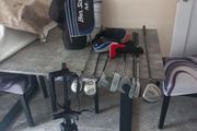 Kids golf clubs and bag and trolley.