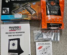 BB Firearm 302 Series CO2 Airsoft Pistol Bundle + Target + BBs + CO2 Canisters
