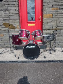 Sonor drum kit with Paiste cymbals.