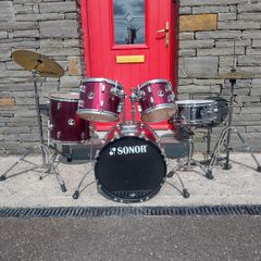 Sonor drum kit with Paiste cymbals.