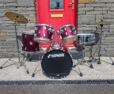 Full Sonor Drum Kit with Paiste cymbals.