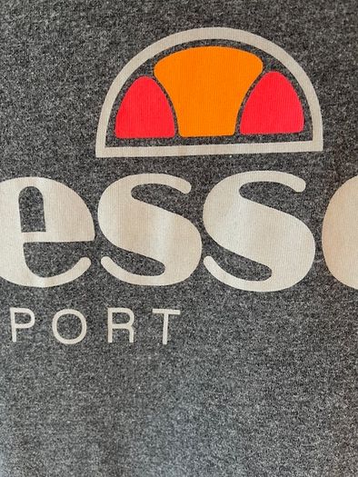 ELLESSE  T-shirt. Size small / medium. Great Quality & In Excellent Condition. Weighty 100% cotton.