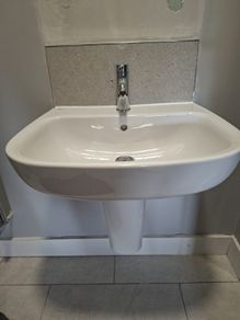 Hand Basin and Tap.