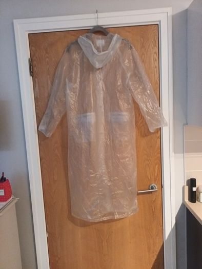 Clear PVC  Vinyl Waterproof Raincoat With Hood.   S. 12.   New-No Tag.