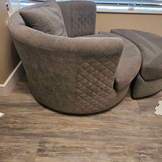 DFS Swivel chair with footstool