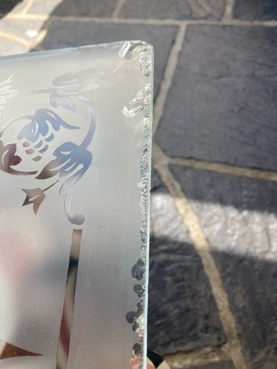Acid etched glass panel