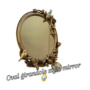 Vintage girandole style mirror