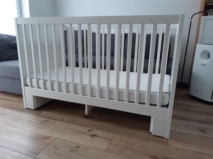 Ikea Stuva crib that can turn into a toddler bed and Ikea Skonast mattress