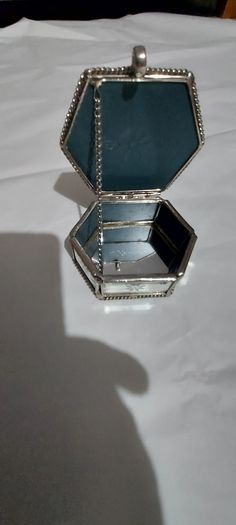 Lovely jewellery box ,,with bevelled mirrors sides and design, see pictures for condition,,take as is ,buyer collects or pays postage thank you