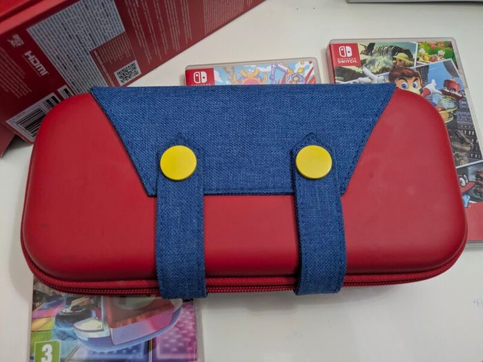 Nintendo Switch OLED (In the box) + Case + Super Mario Odyssey + Bomberman