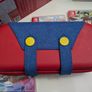 Nintendo Switch OLED (In the box) + Case + Super Mario Odyssey + Bomberman Image 2