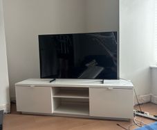 Ikea 'BYAS' glossy white TV unit