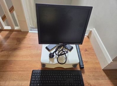 Dell  monitor with adjustable stand and wireless keyboard, working perfect