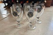 Open Gate Brewery branded beer glasses.