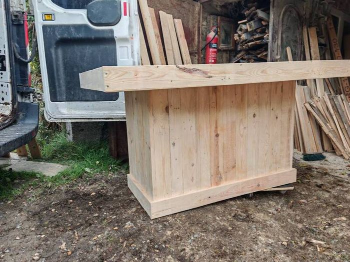 Rustic kitchen island with triple overhang